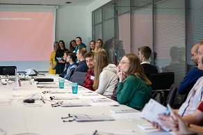 Young employees gathering in the office room