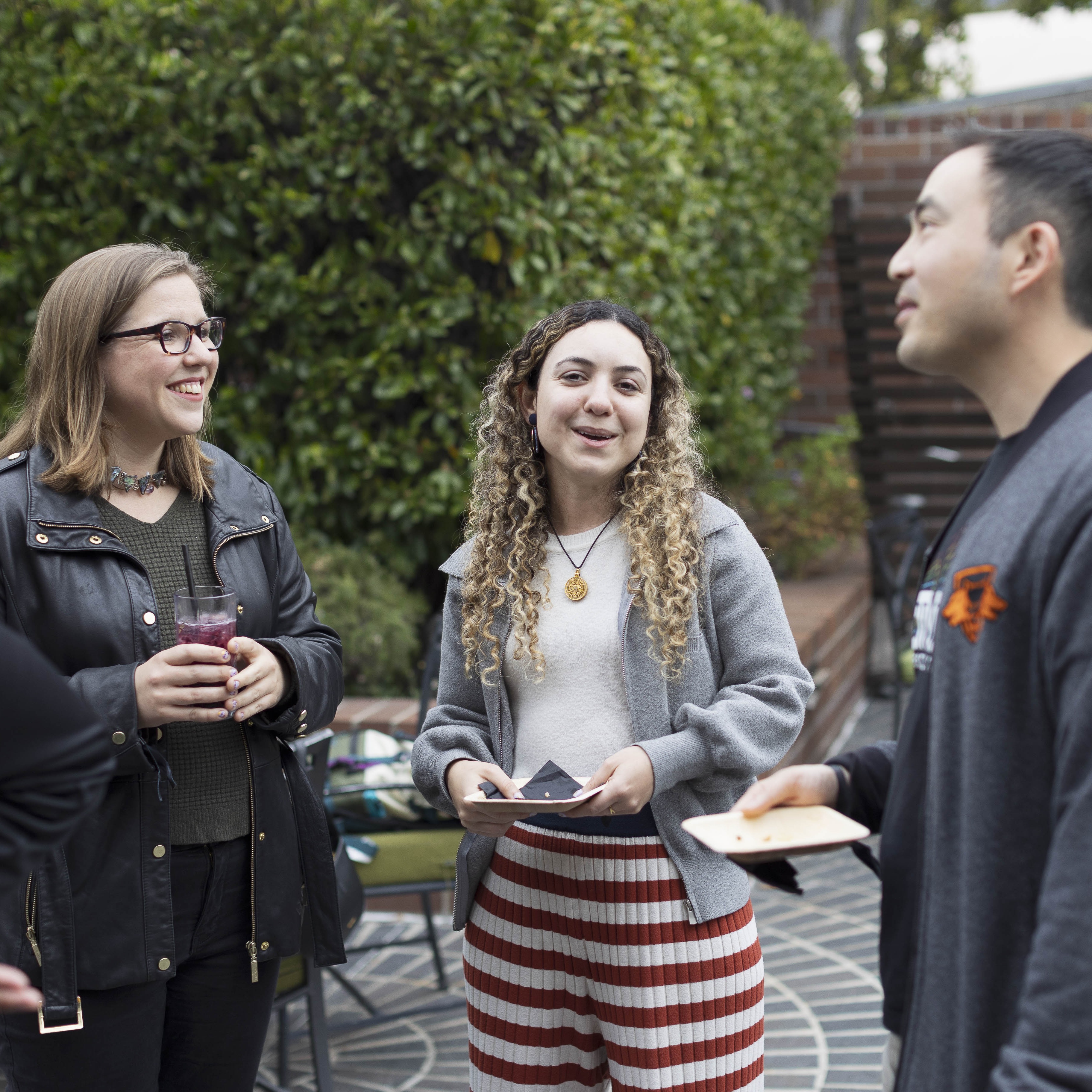 Three Employees Talking Outside