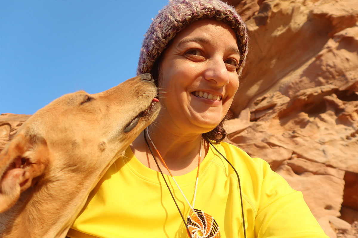 woman-dog-red-rocks