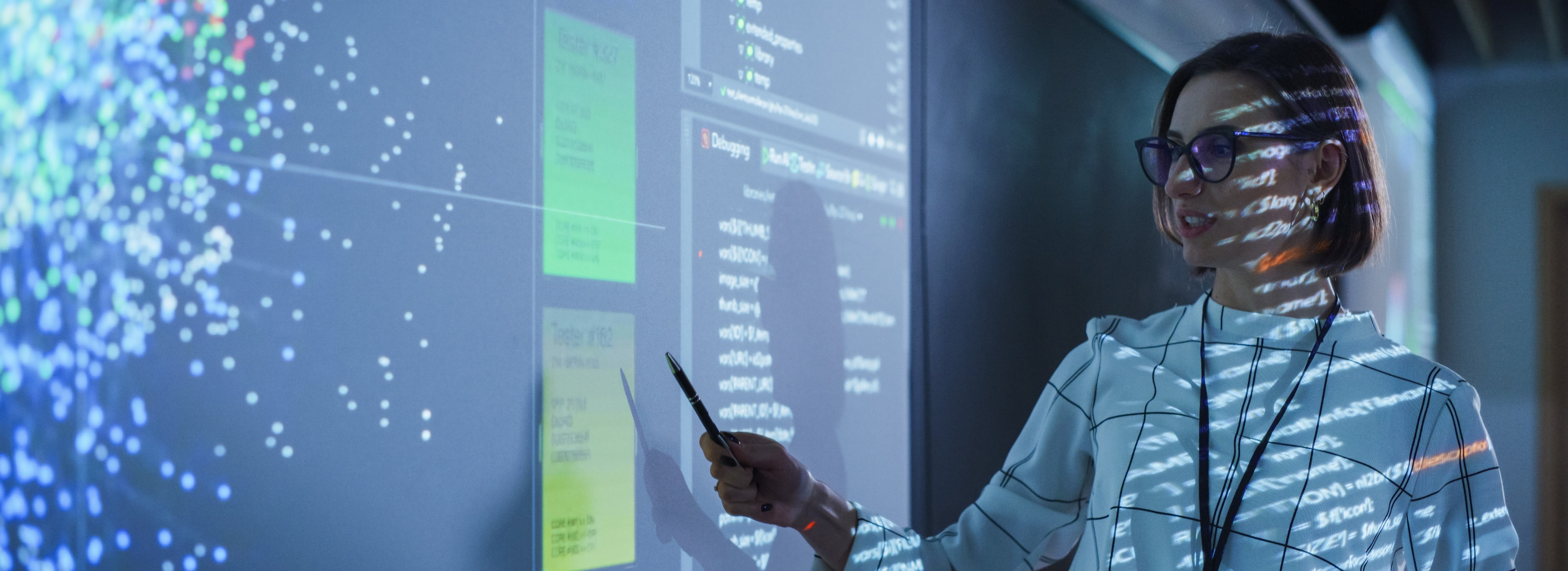 Woman using interactive whiteboard