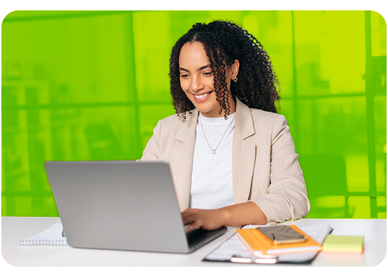 Female recruiter sitting at table with laptop 