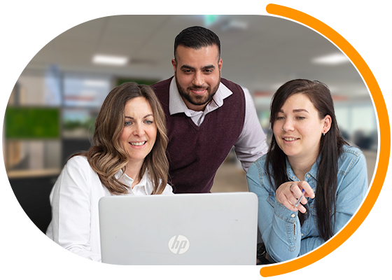 Group of employees in meeting smiling