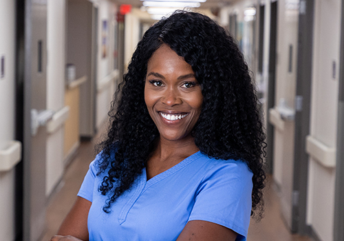 Tile - Ascension - Explore float opportunities - Nurse standing in hospital unit hallway