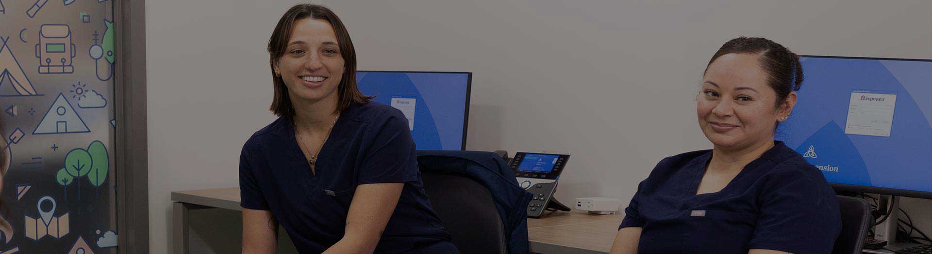 Page Header Image - Ascension Careers Events - Two female medical professionals at desk with computers