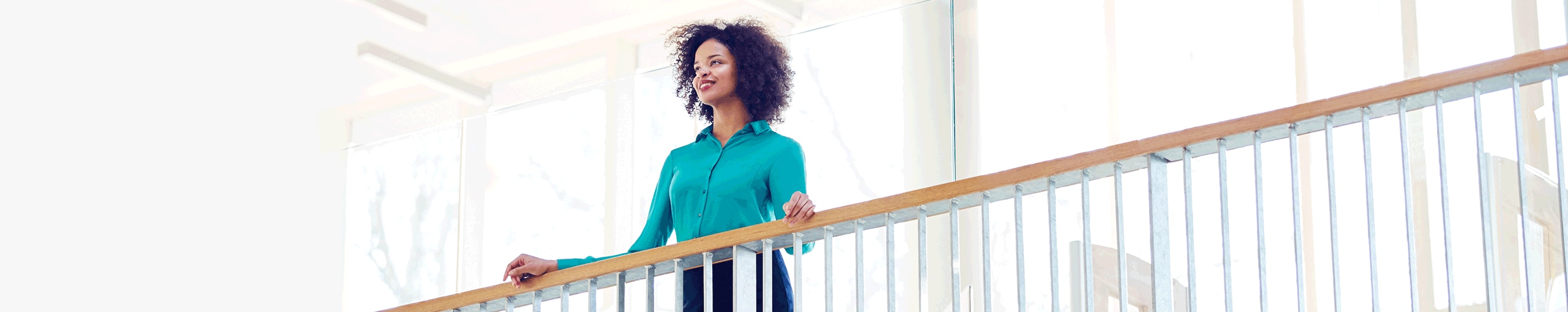 Confident young employee looking forward