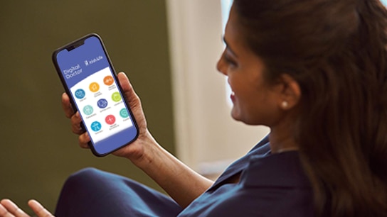 Women ooking at her smartphone 