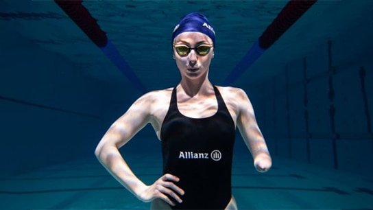 Paralympic swimmer wearing a bathsuit and being under water