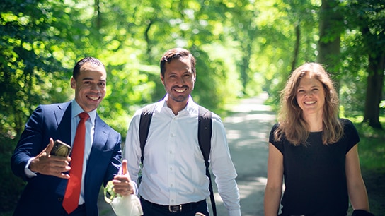 Katharina and her colleagues smiling at the camera