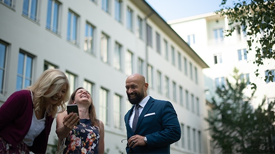 Katharina and her colleagues in a joyful conversation