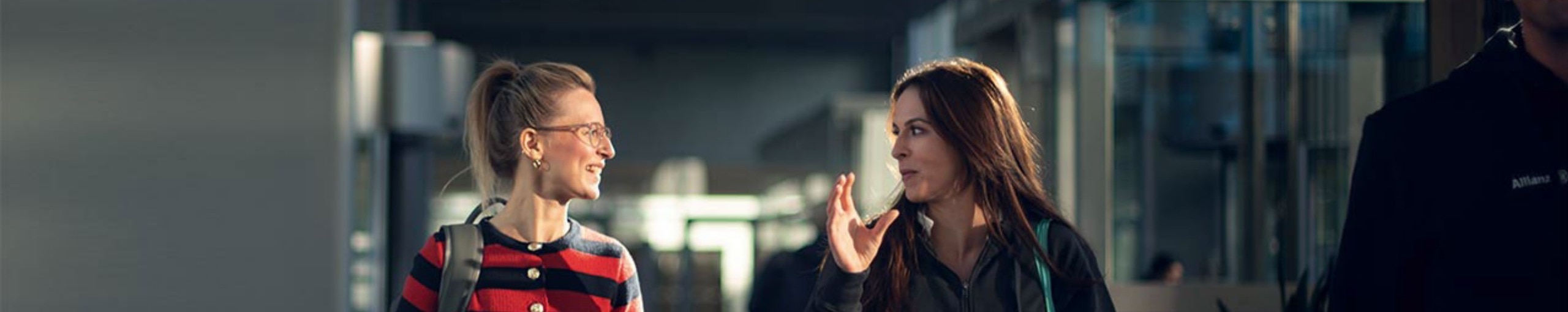 Two woman talking to each other