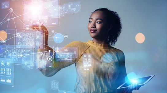 Young woman touching a digital screen