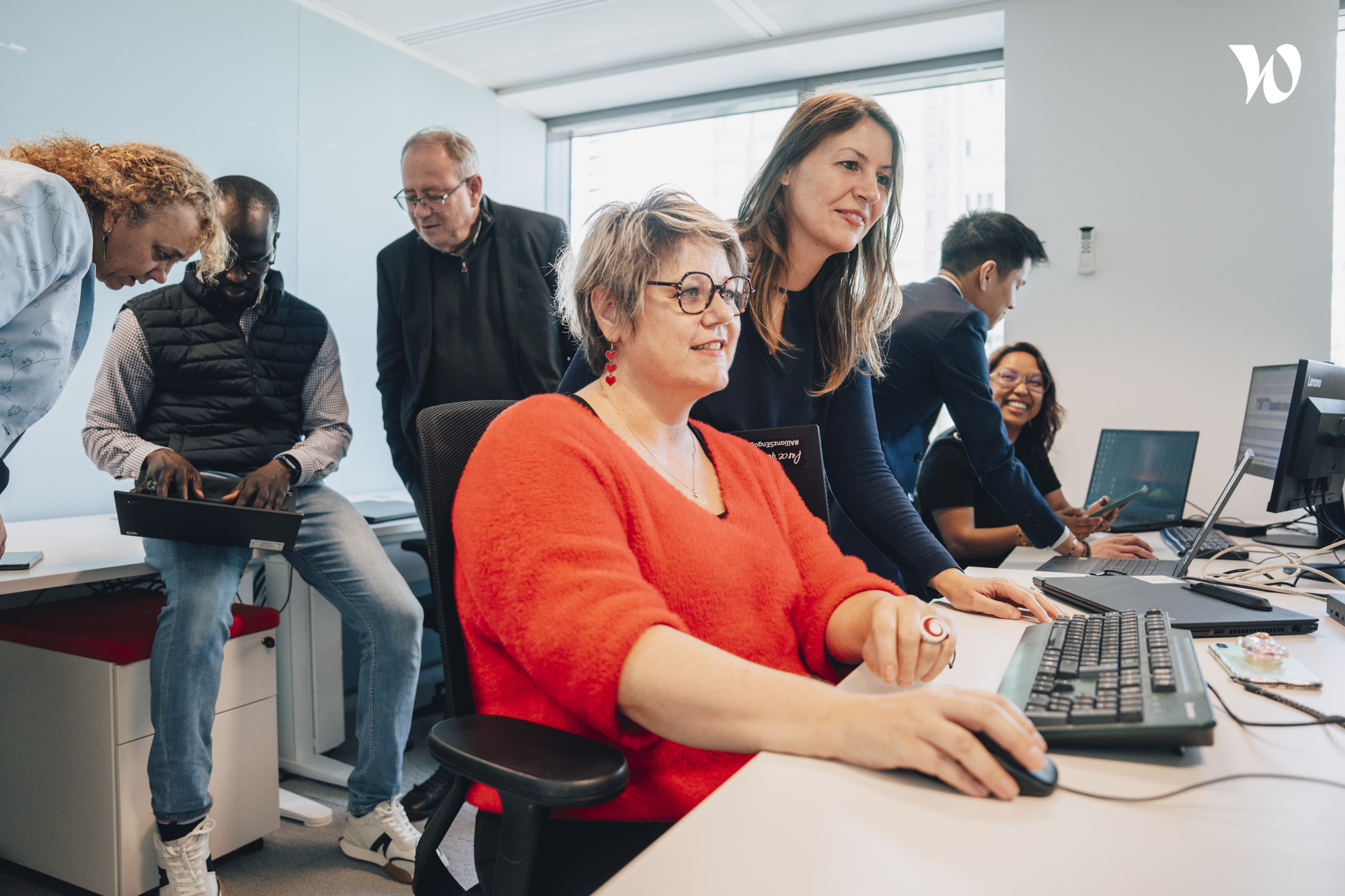 Allianz colleagues discussing work