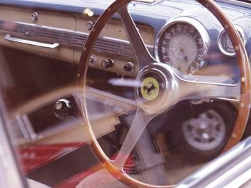 A steering wheel and dashboard of a car