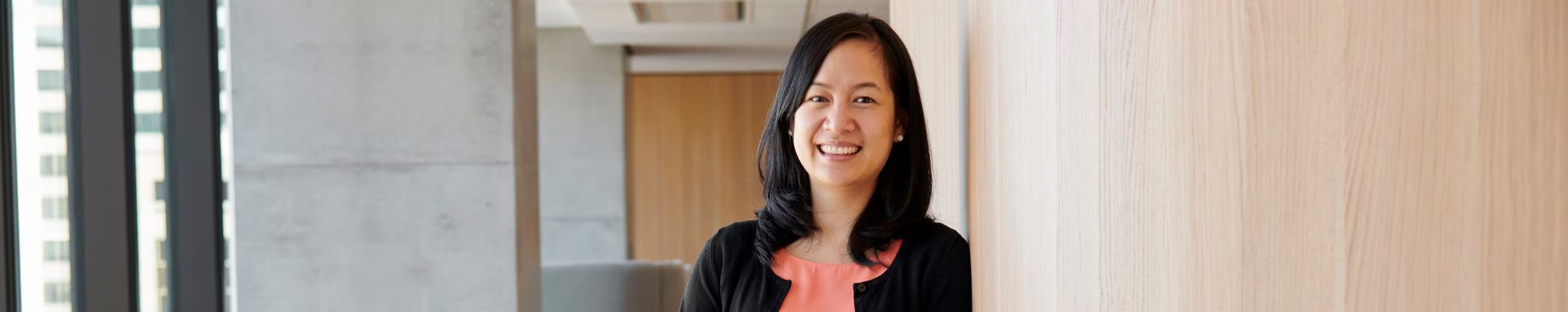 A confident employee with a welcoming smile