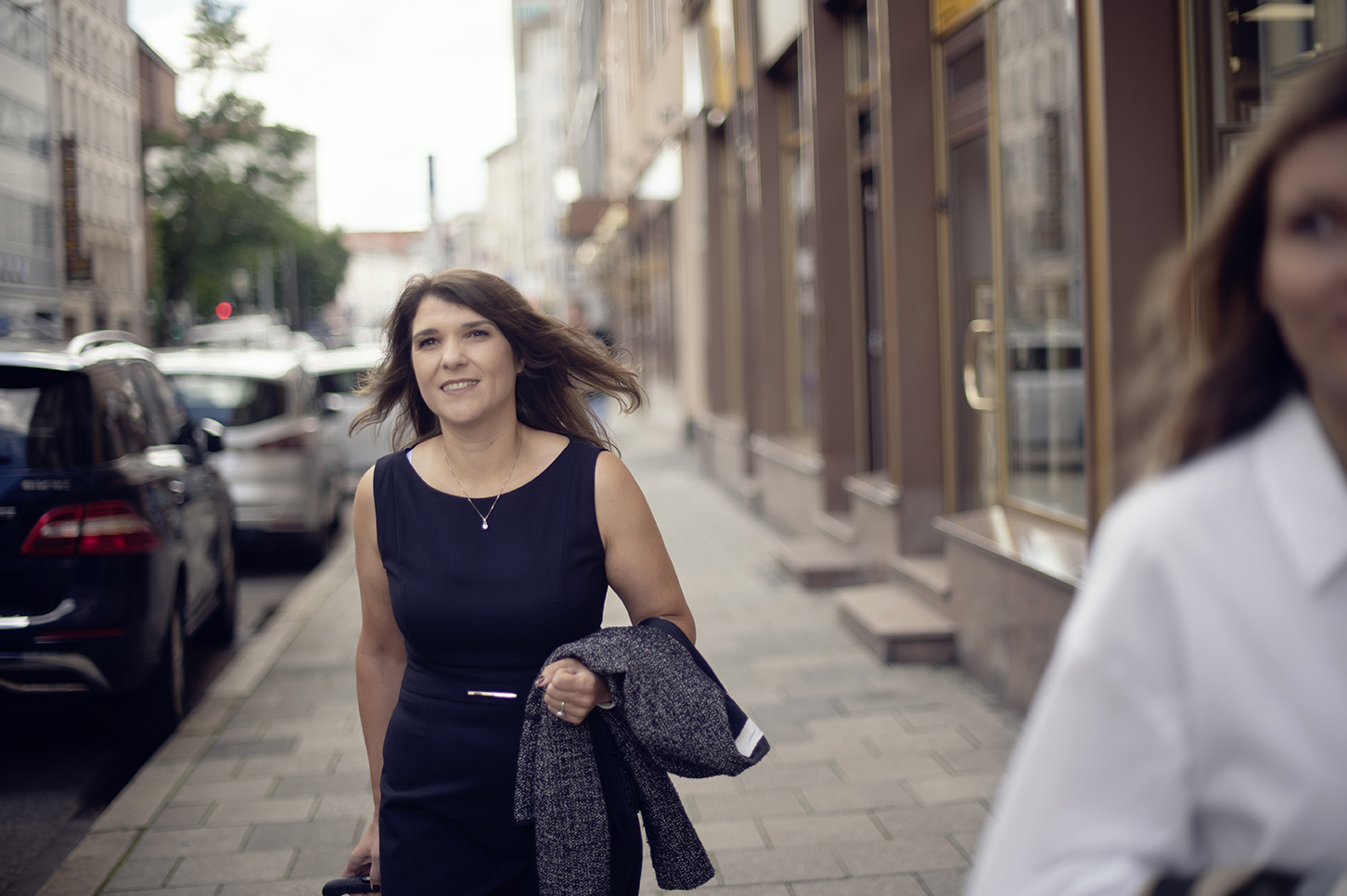 Woman with suitecase walking