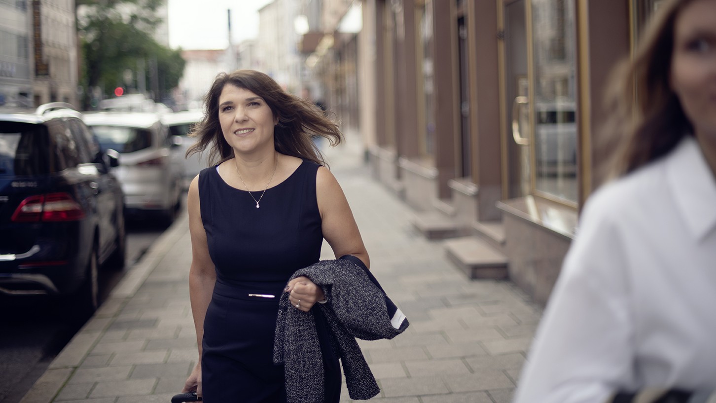 Woman with suitcase walking