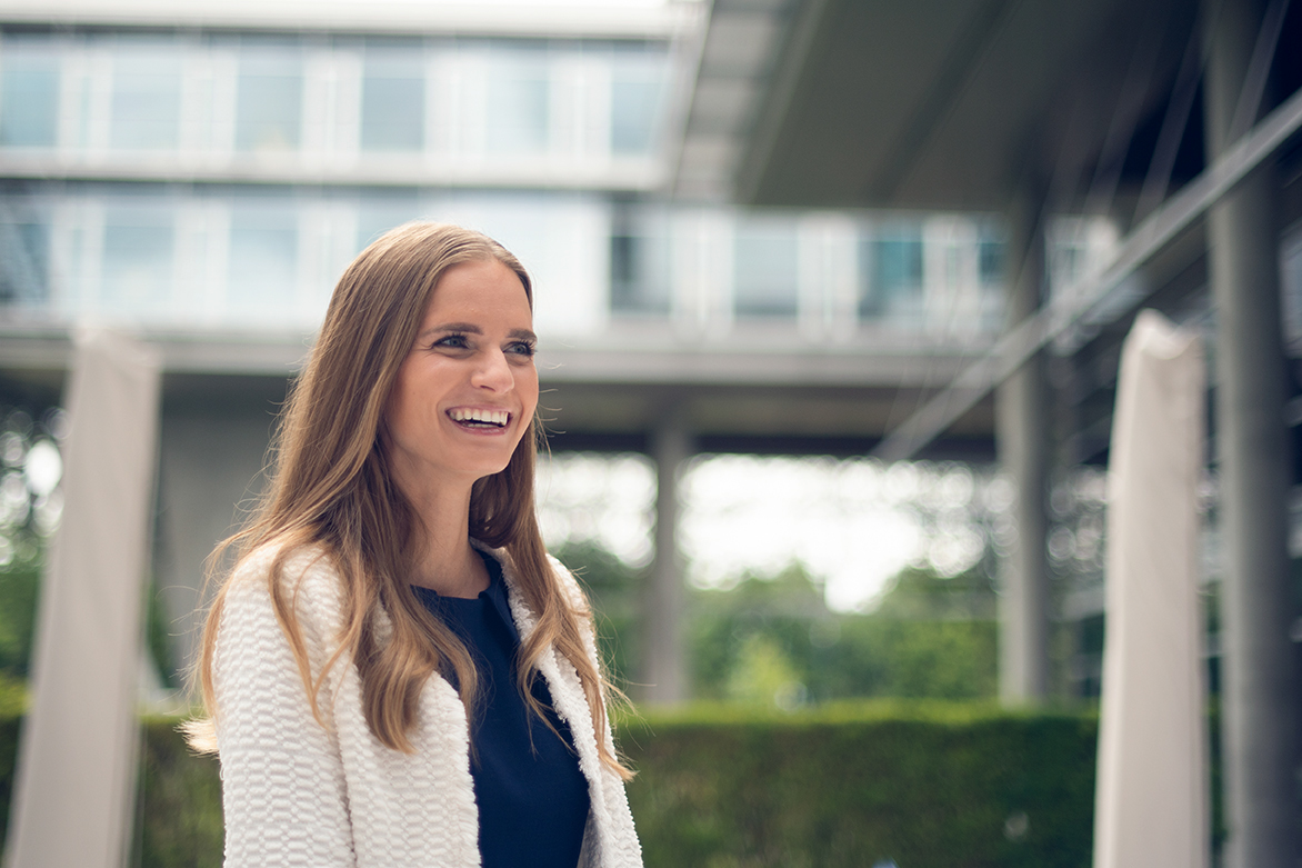 Allianz young employee with cheerful expression