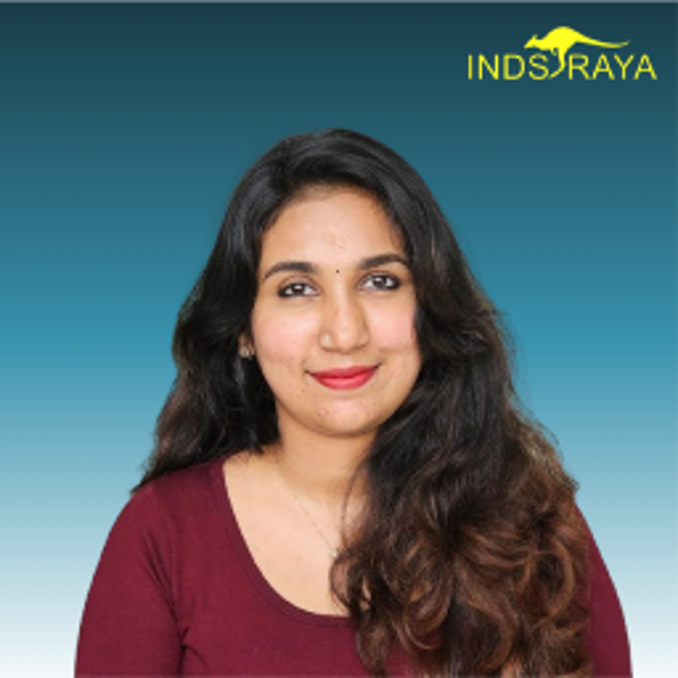 Women in front of blue background