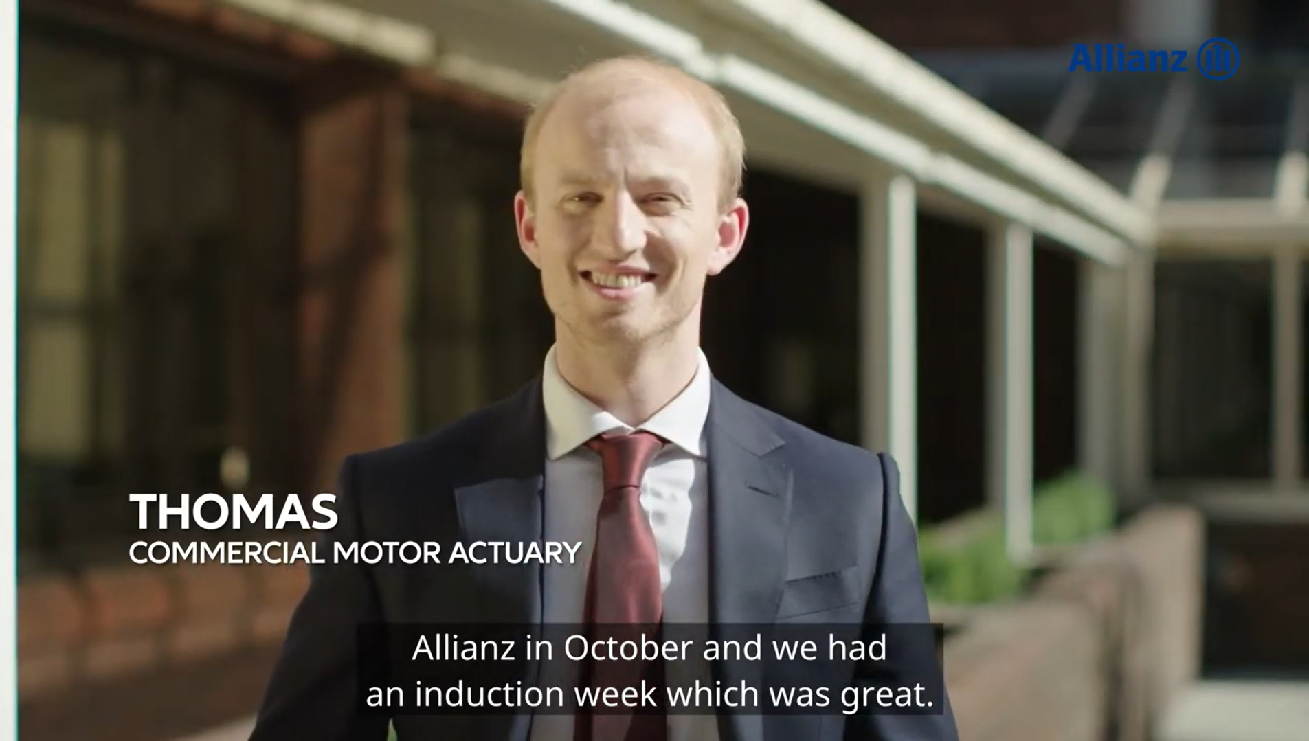 Thomas smiling with text "Thomas, Commercial motor actuary"