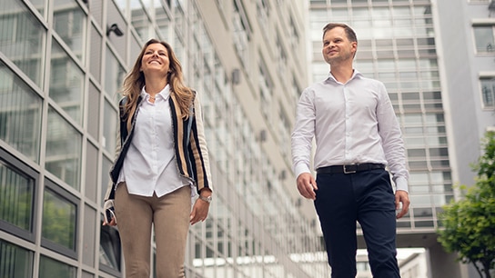 Two Allianz colleagues walking together