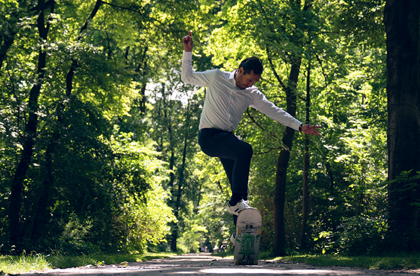 Allianz employee balancing on a skateboard