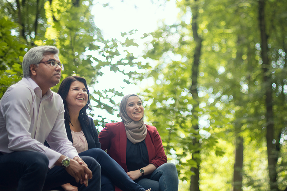 Team members gathered outdoors, reflecting workplace inclusion.