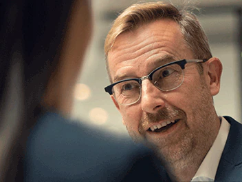 man talking and smiling