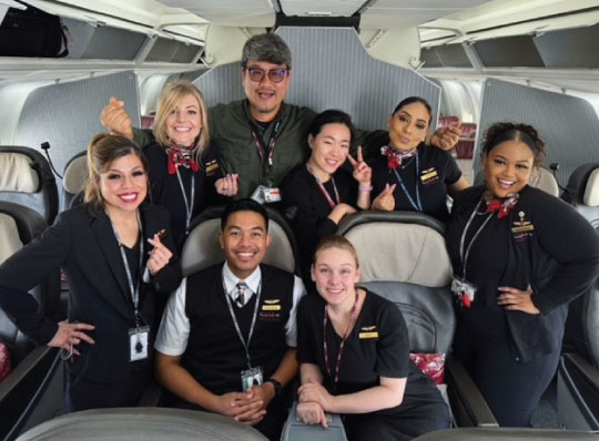 Omni Air International Crew taking a group photo