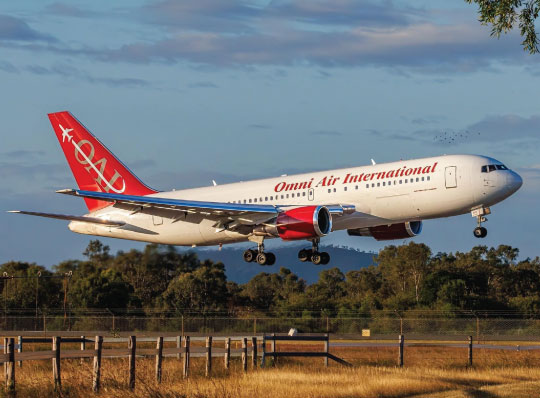 Omni Air International Aircraft Taking Off