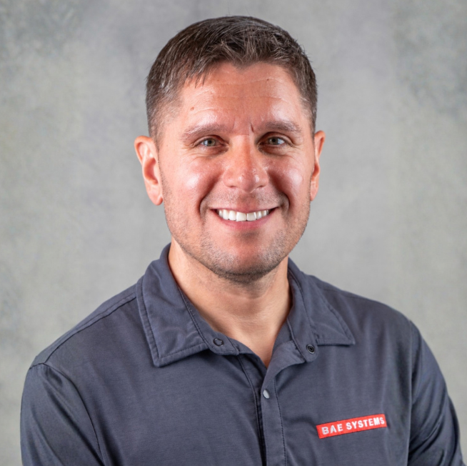 Chad, a talent acquisition professional for the intelligence and security team, poses for a headshot.