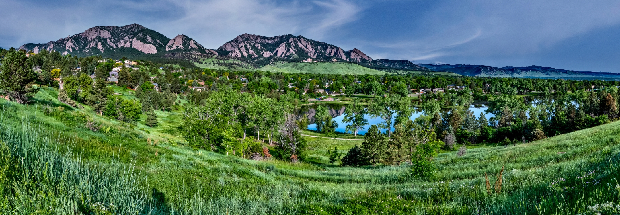 A panoramic view of the Flatiron mountains in Boulder, CO.