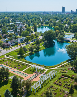 Image of Aerial Lakeside Park gardens and fountains with distant downtown Fort Wayne.