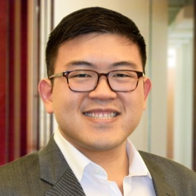 A man named Nicol smiling at the camera