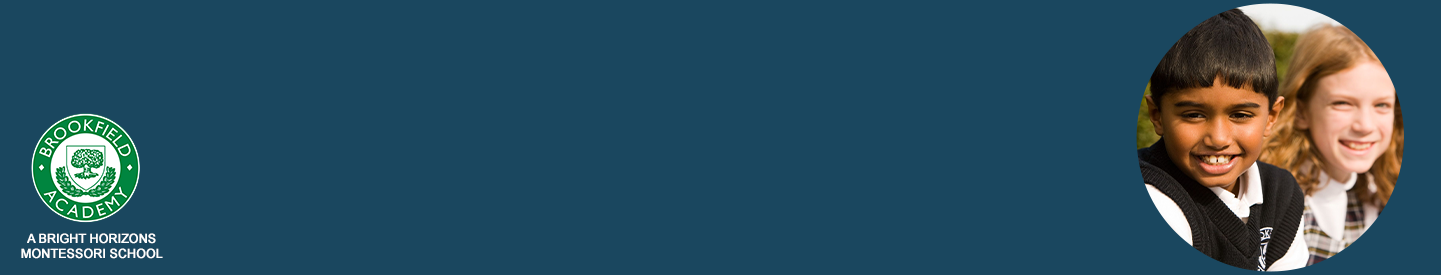 Logo of Arrowhead Academy alongside a circular photo of two smiling children in school uniforms.