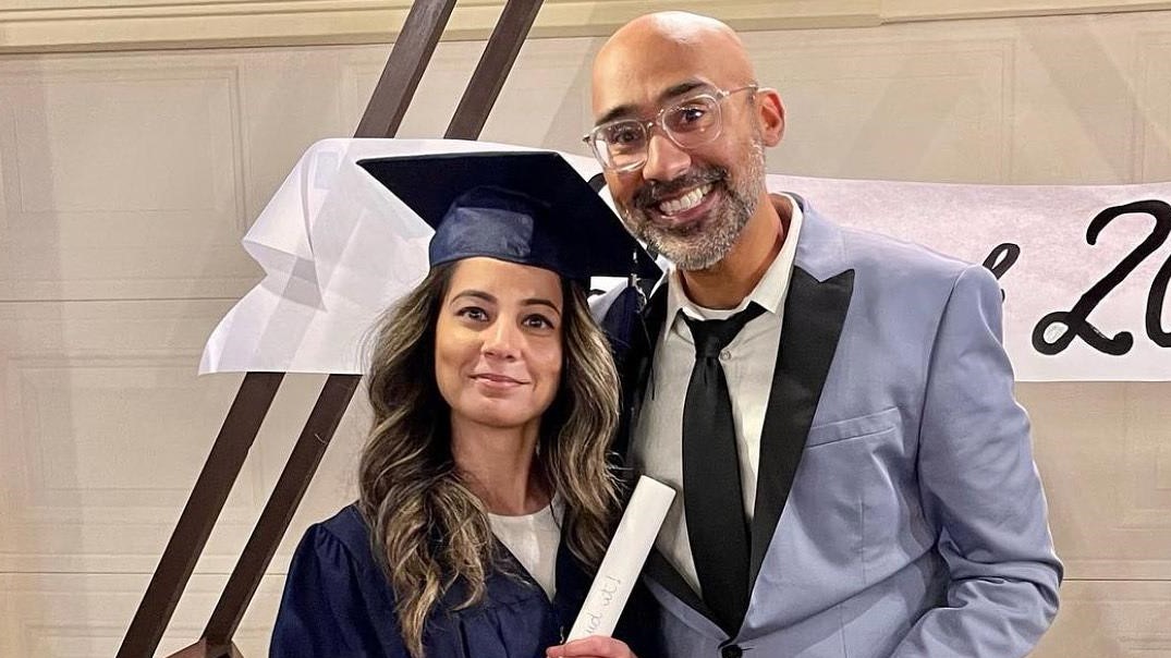 Sidra in a cap and gown with husband