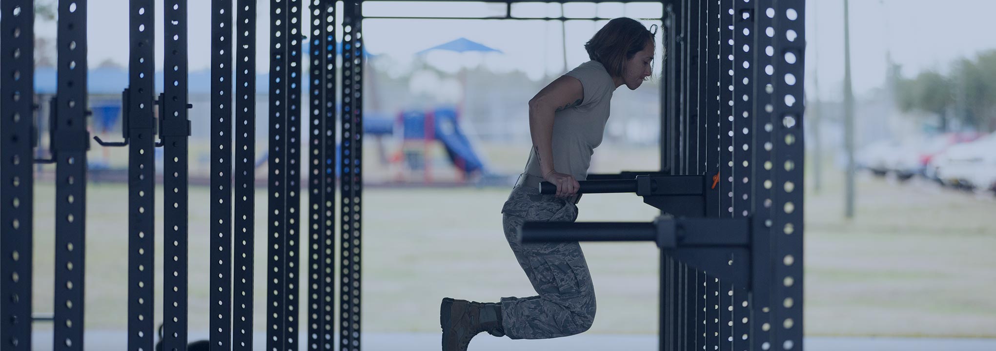 soldier-doing-dips-blue-overlay