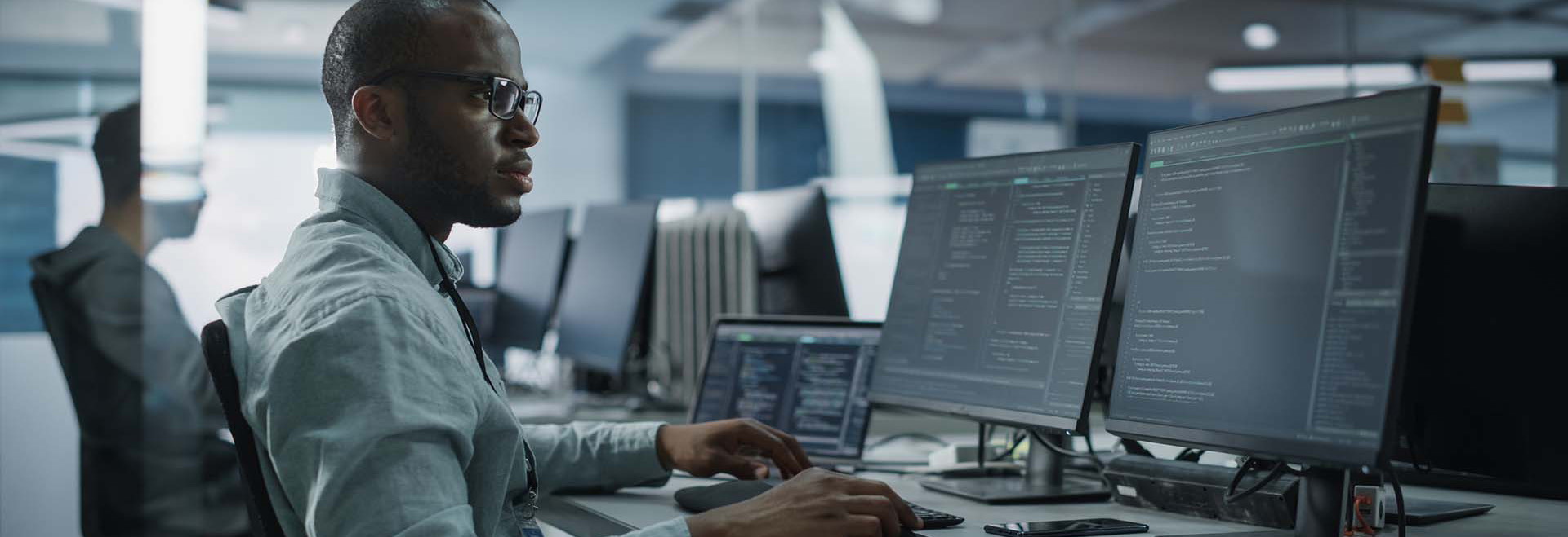 professional-working-on-desktop-coding