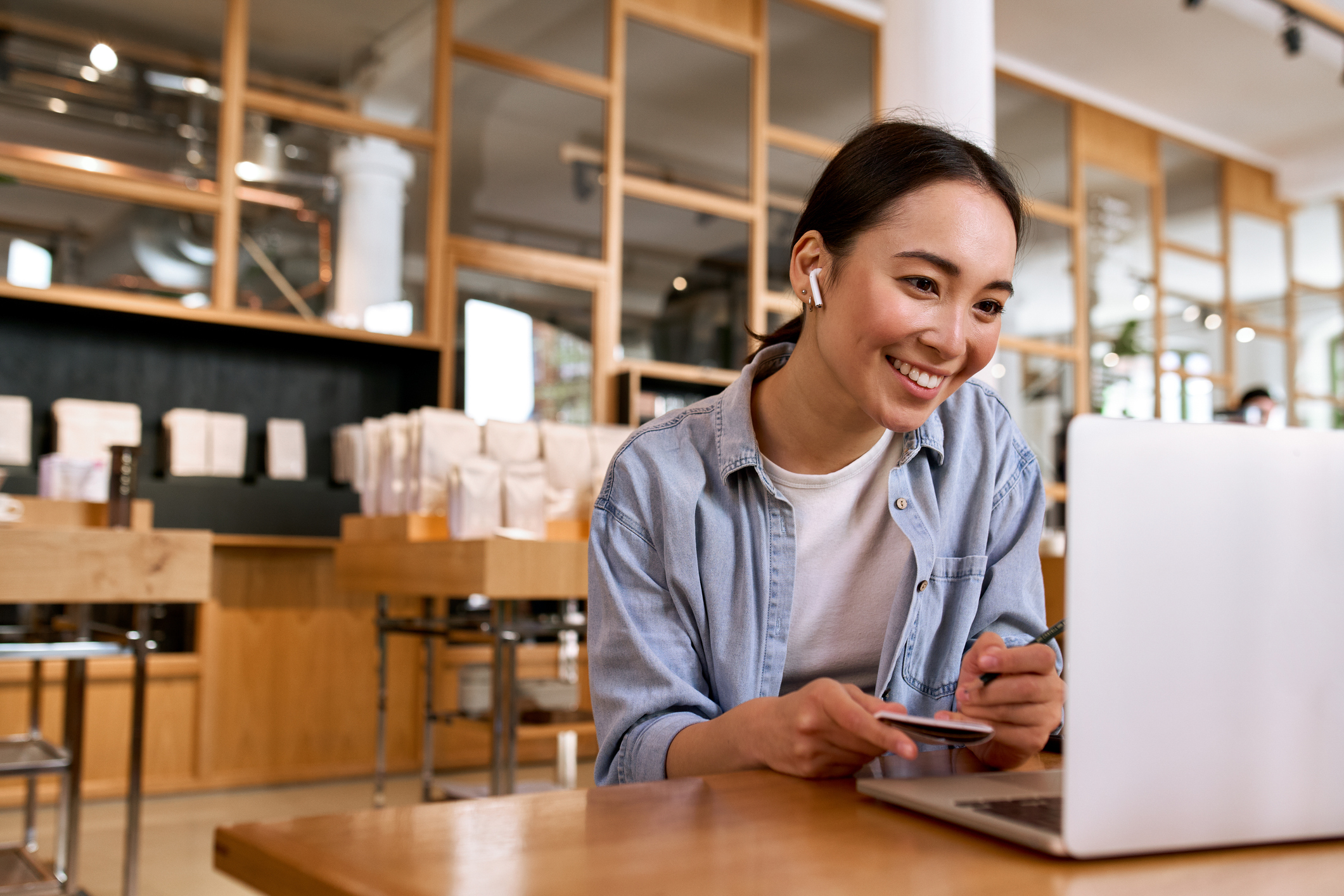 young-intern-working-in-modern-cafe
