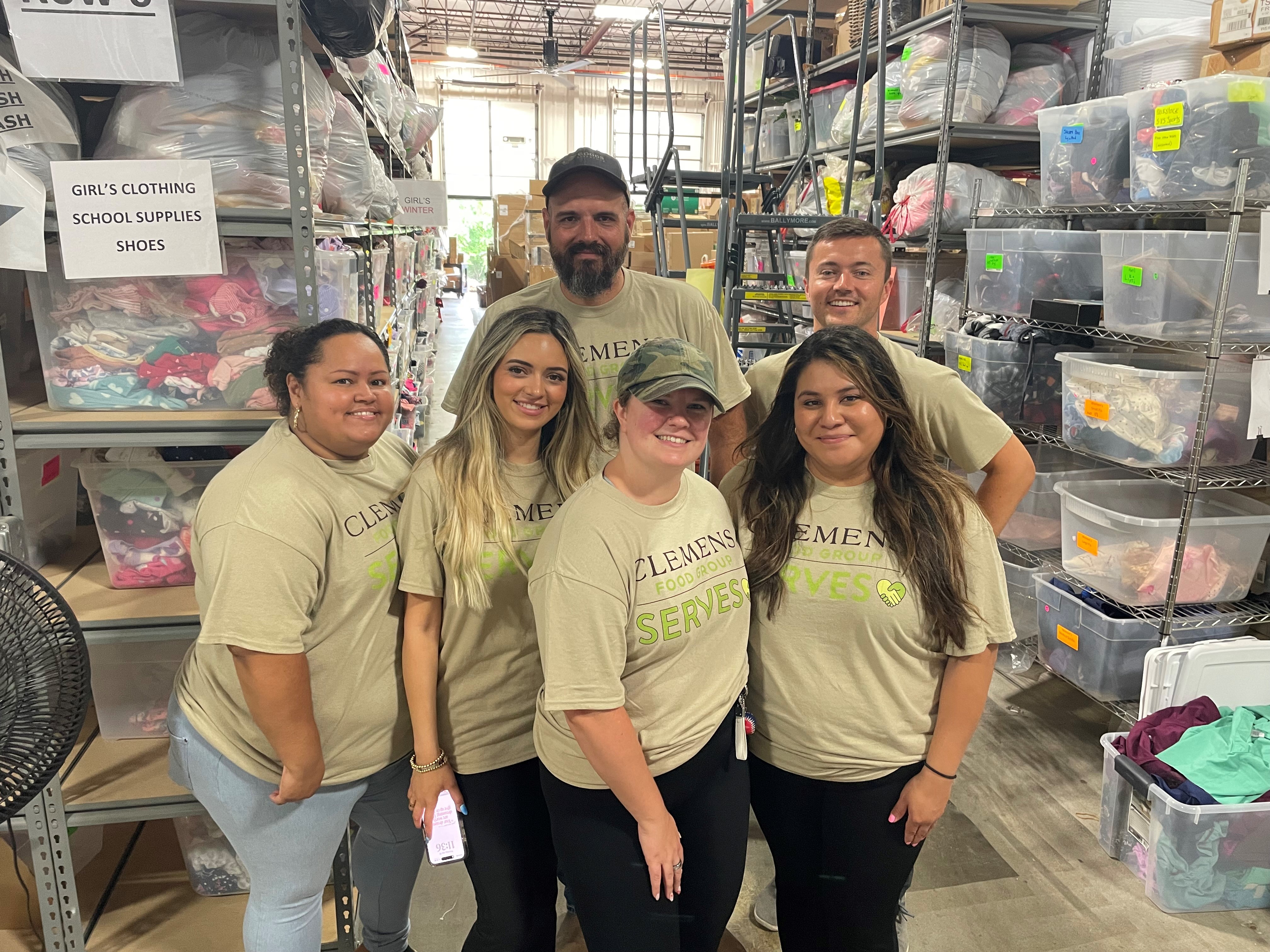 Team members volunteering at a local nonprofit