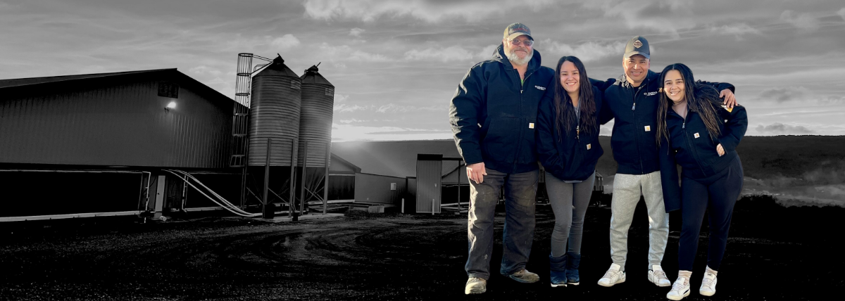 Team Members standing outside a CVFF barn