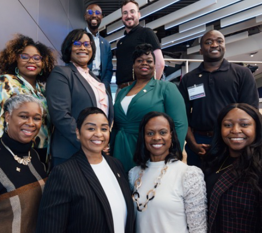 A group of our BOND ERG members pose for a photo at our headquarters.