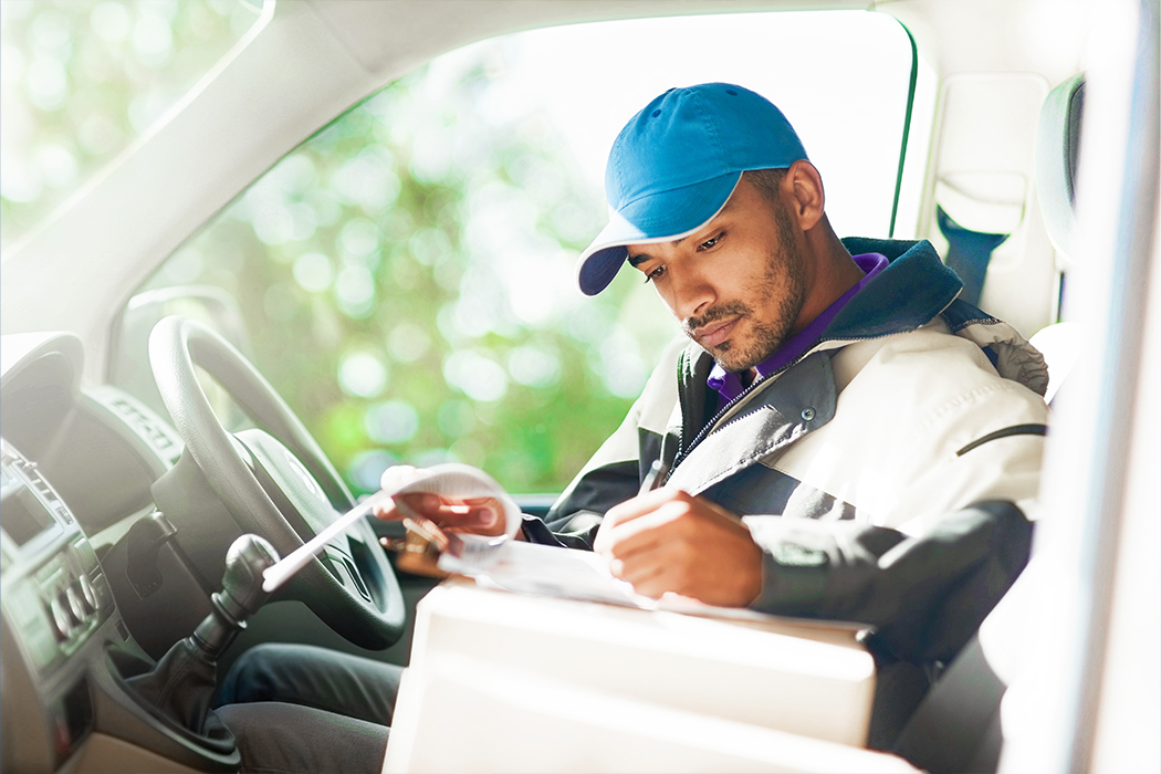 Driver in a delivery van