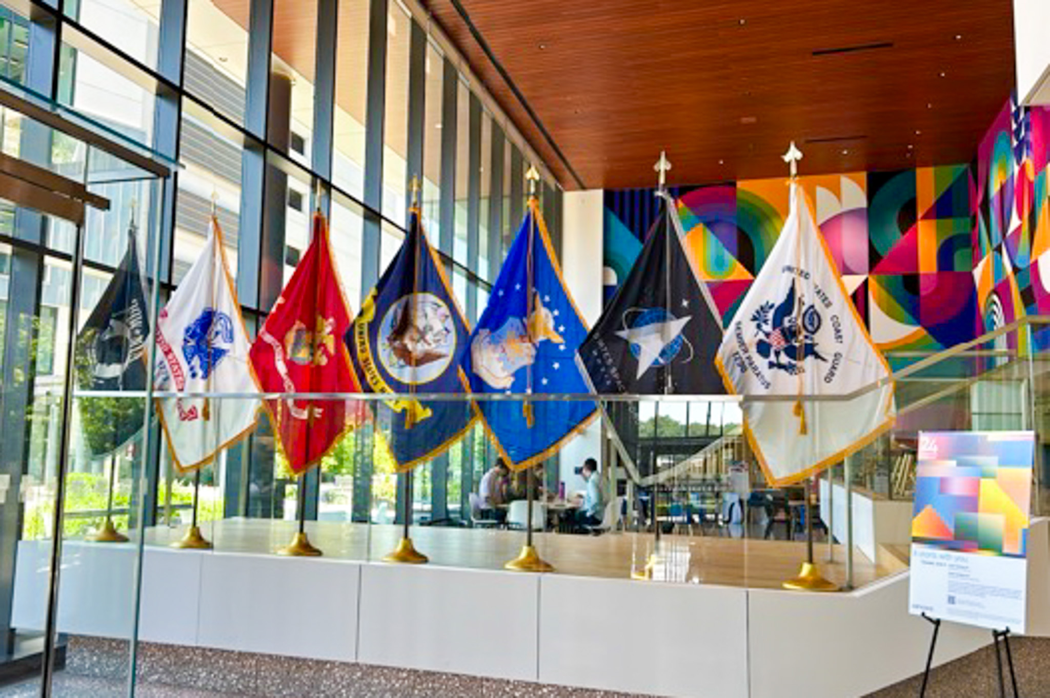 Several flags representing branches of the armed forces are displayed in Cencora's headquarters in honor of Memorial Day. 