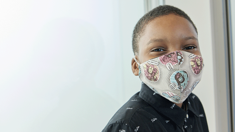 CHOP patient smiling under mask