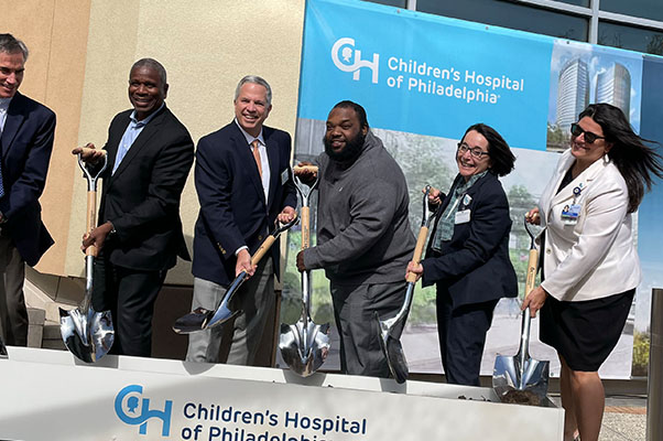 CHOP employees and community leaders breaking ground at new research facility.