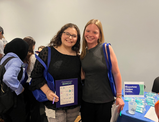 Two RULDP associates posing together