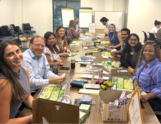 Employees smiling at a group activity