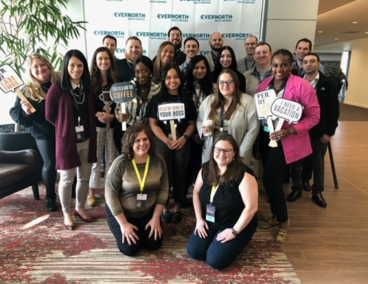 PUDP associates posing for a large group photo during Summit