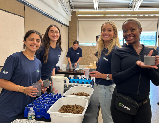 SCDP participants posing at a volunteer event