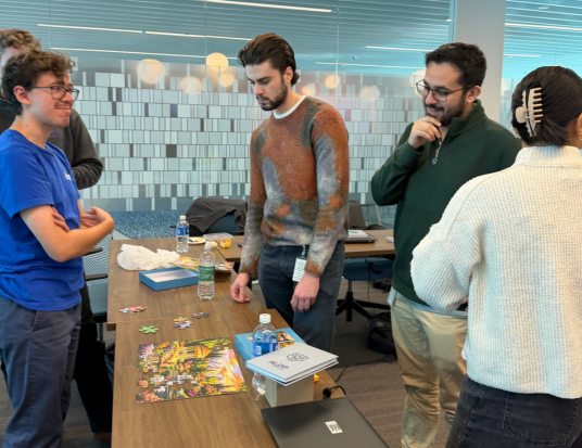ALDP associates working on a puzzle
